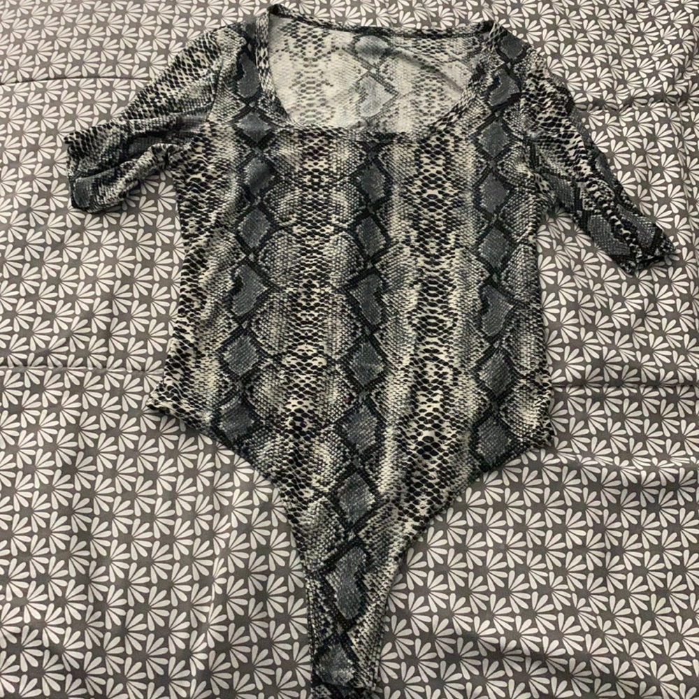 grey leopard body suit
